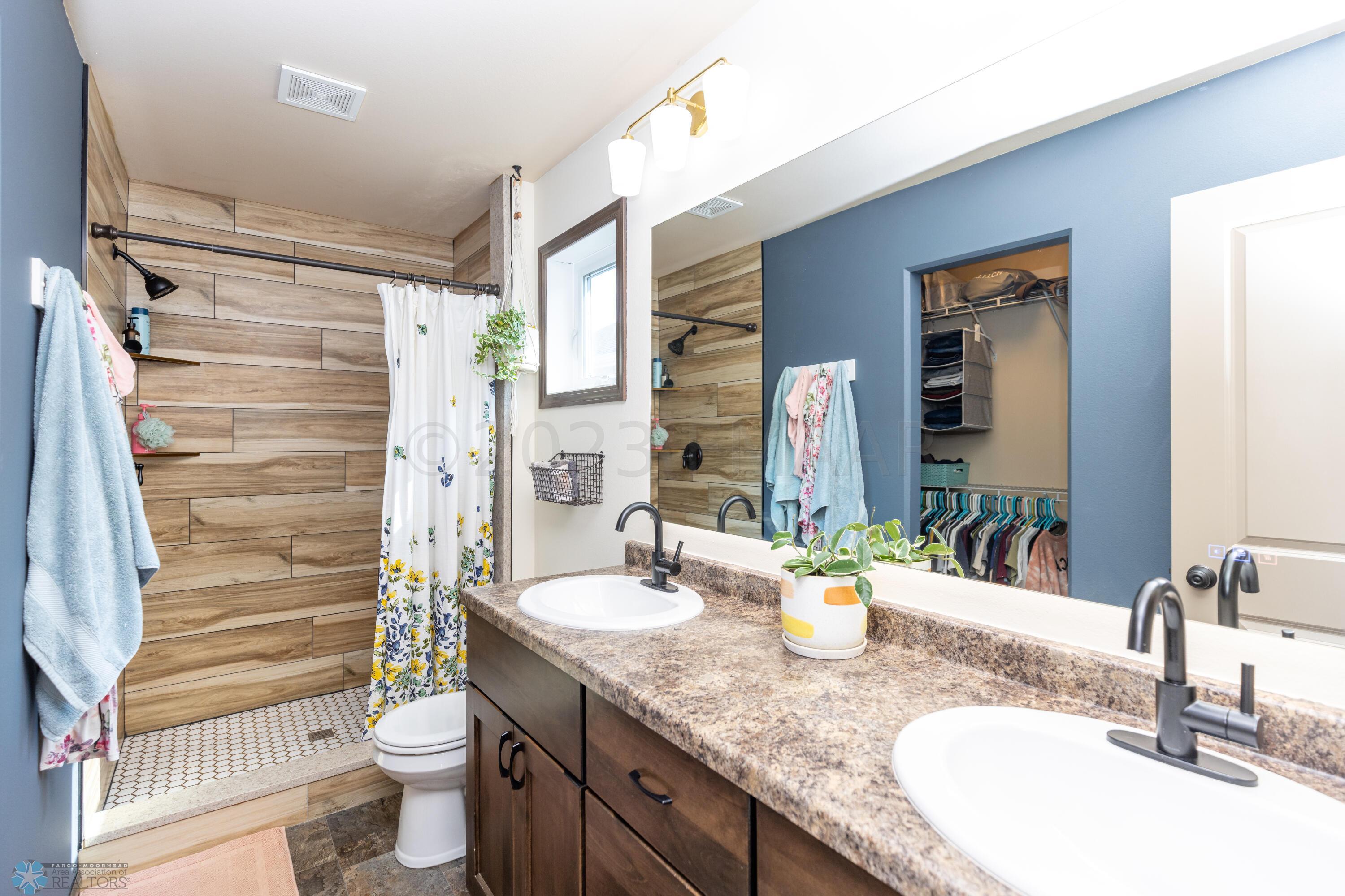Primary Bathroom with Tile Shower