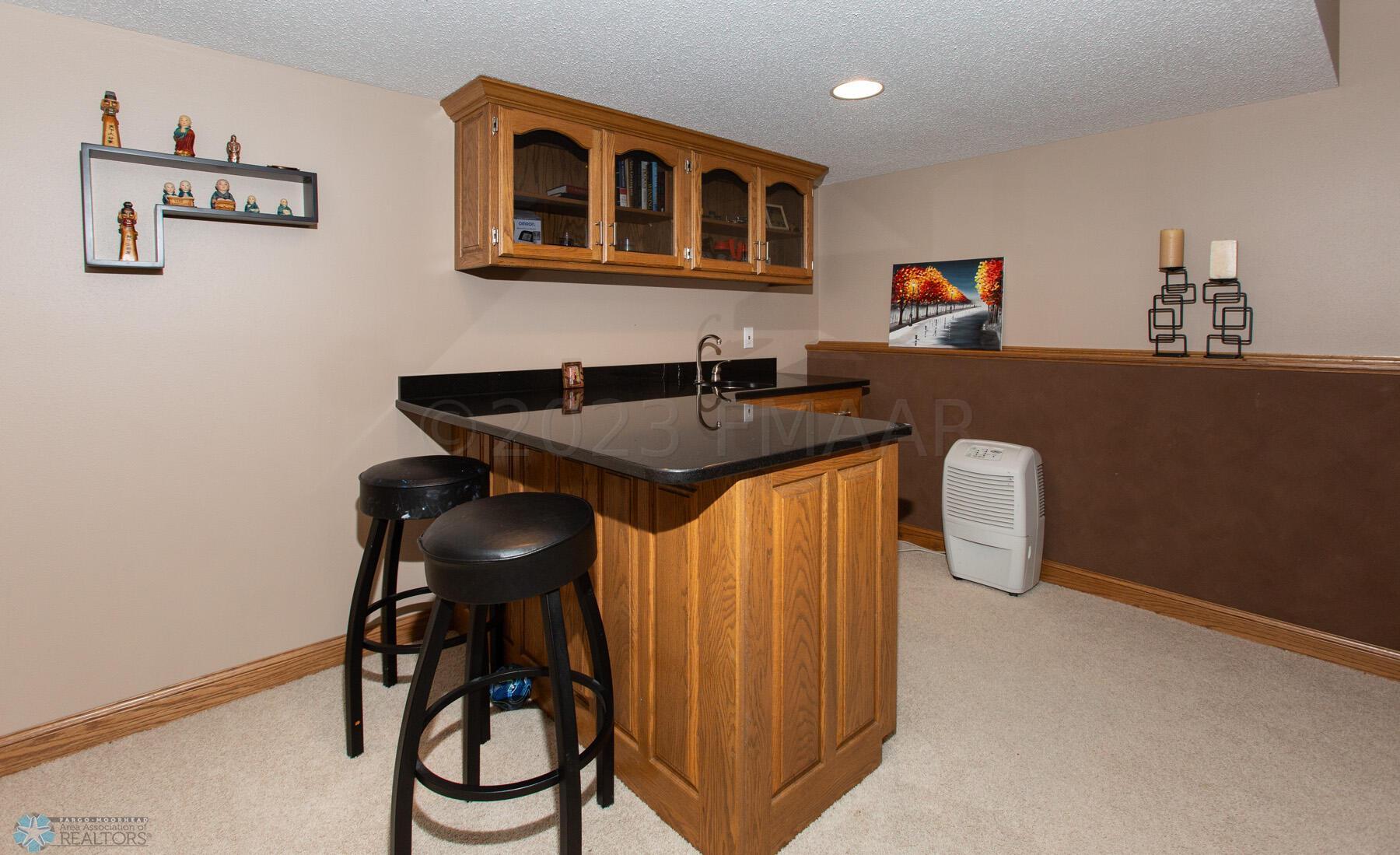 Lower Level Family Room w/Wet Bar!
