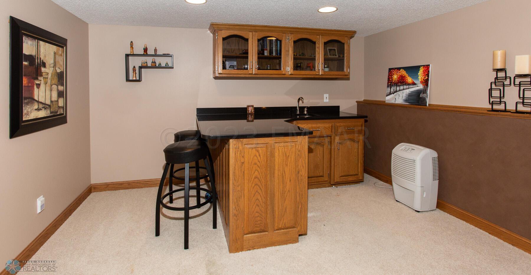 Lower Level Family Room w/Wet Bar!