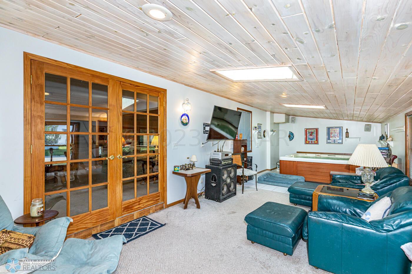 4 season room with hot tub