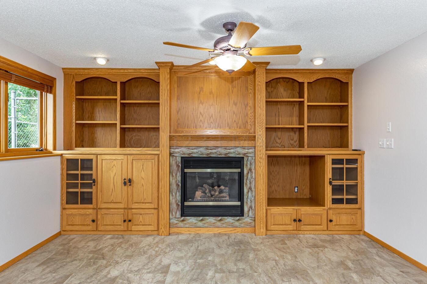 Built ins and gas fireplace