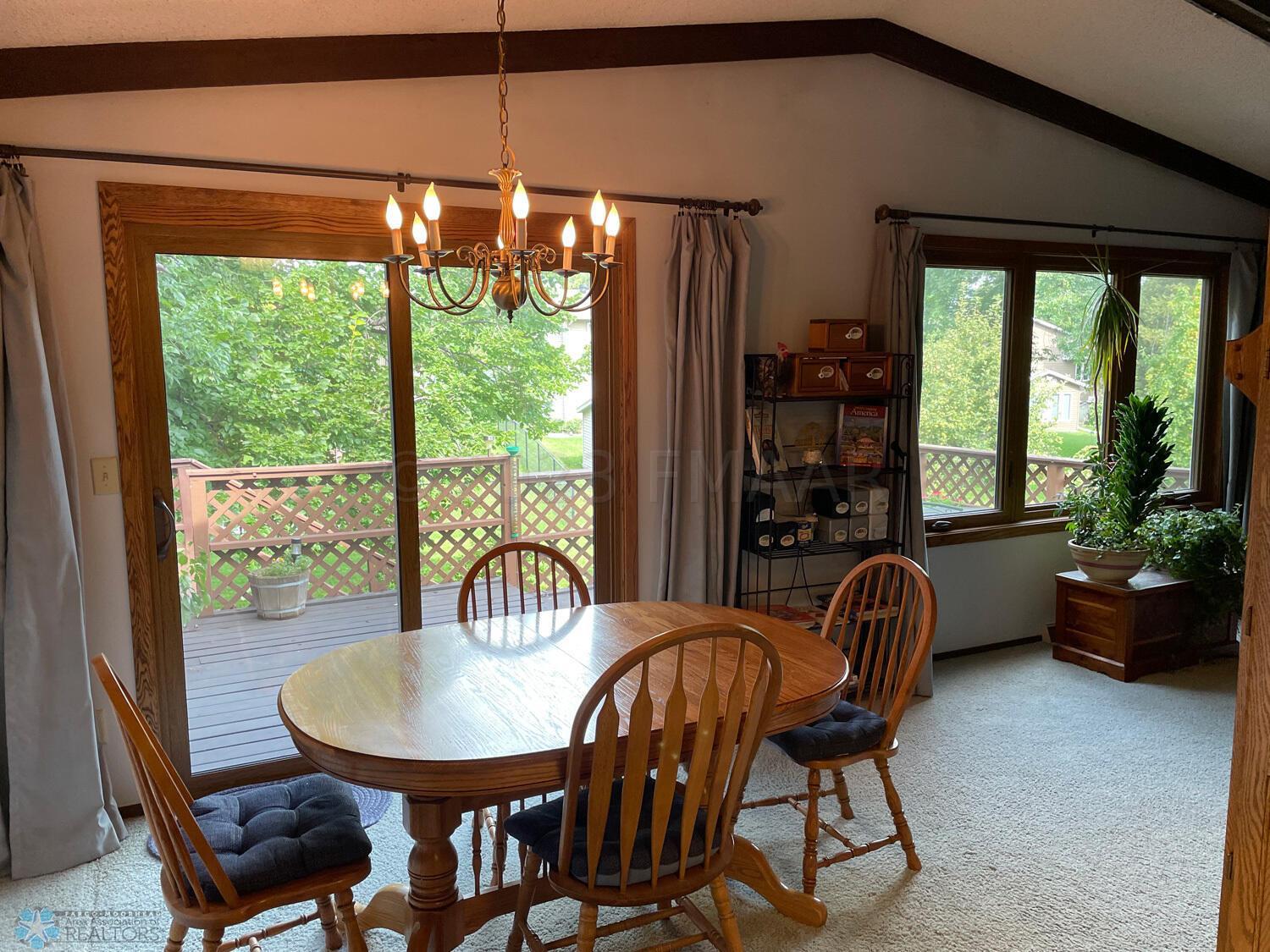 Dining-area-view-toward-deck-and-living-