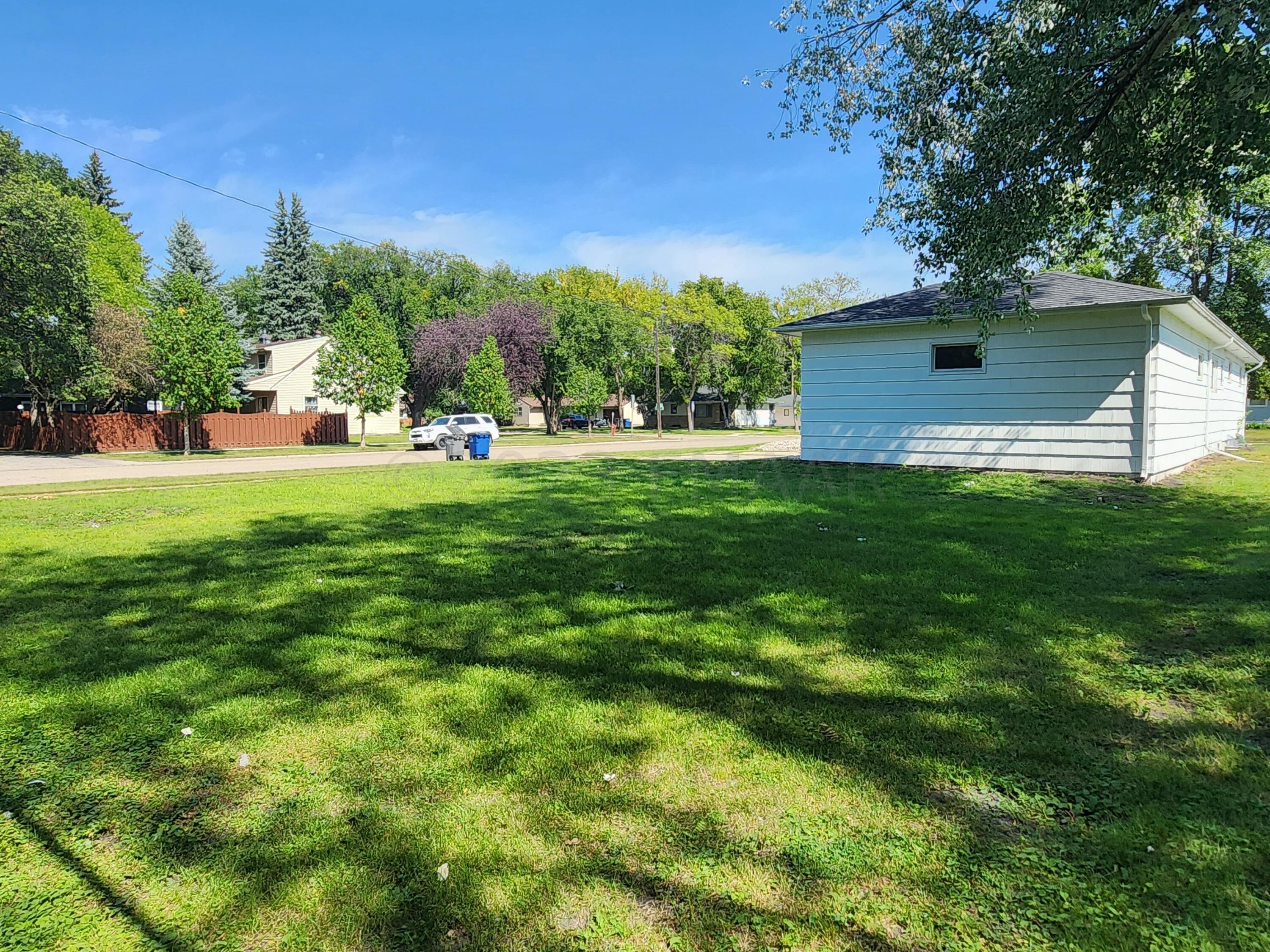Large Corner Lot & Beautiful Backyard!