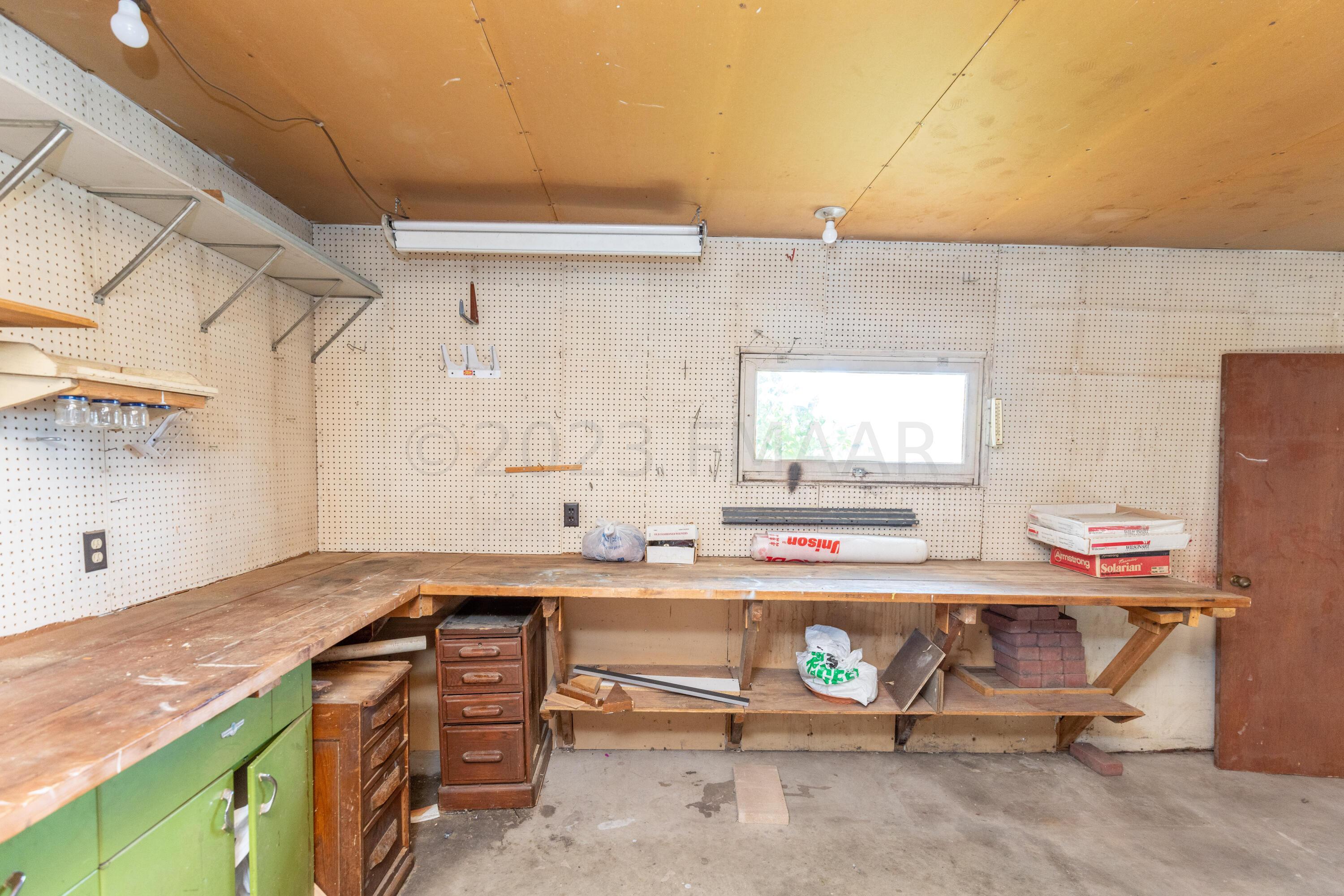 All Shelving and Work benches included