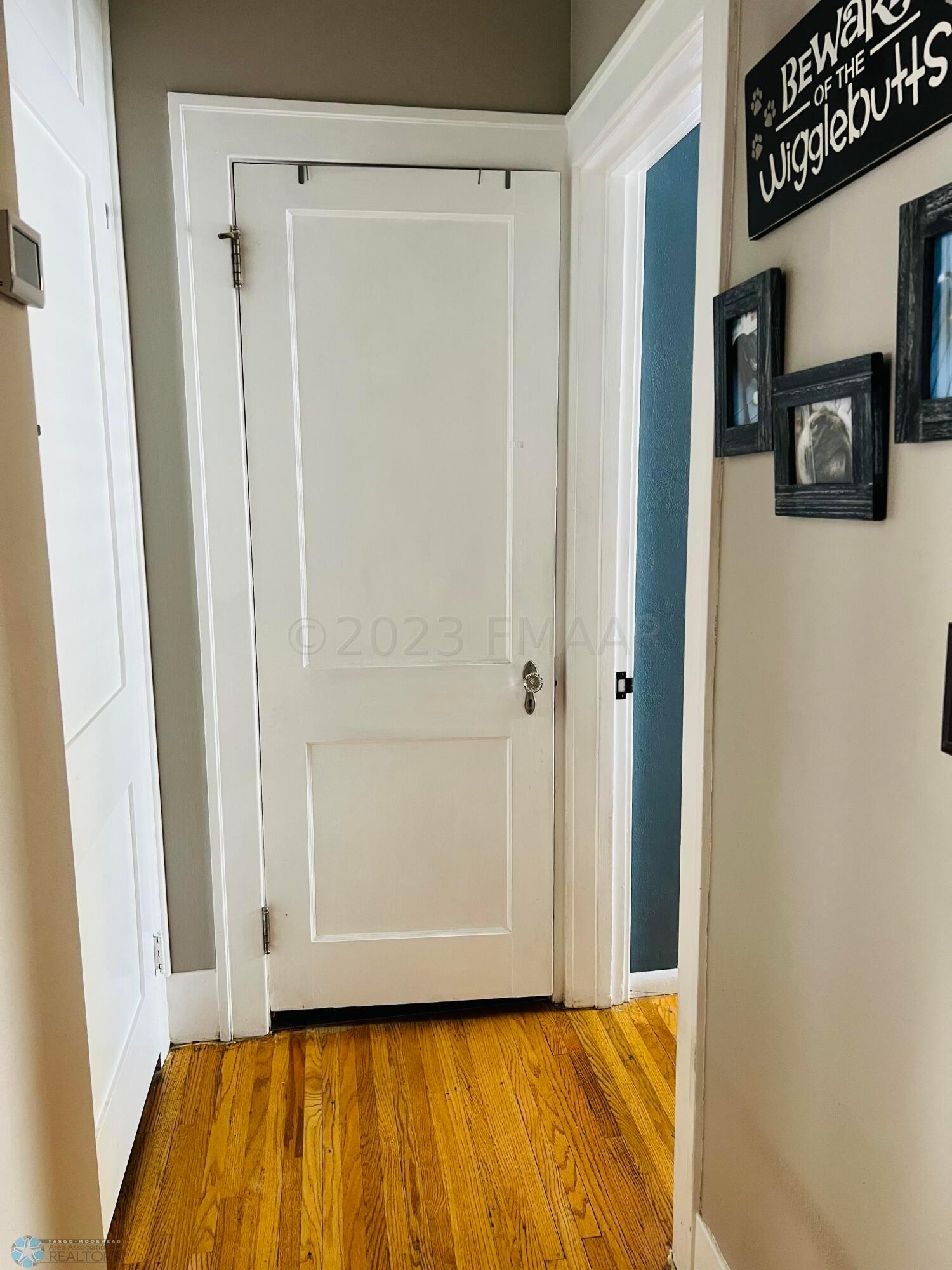 Main floor hallway to bathroom