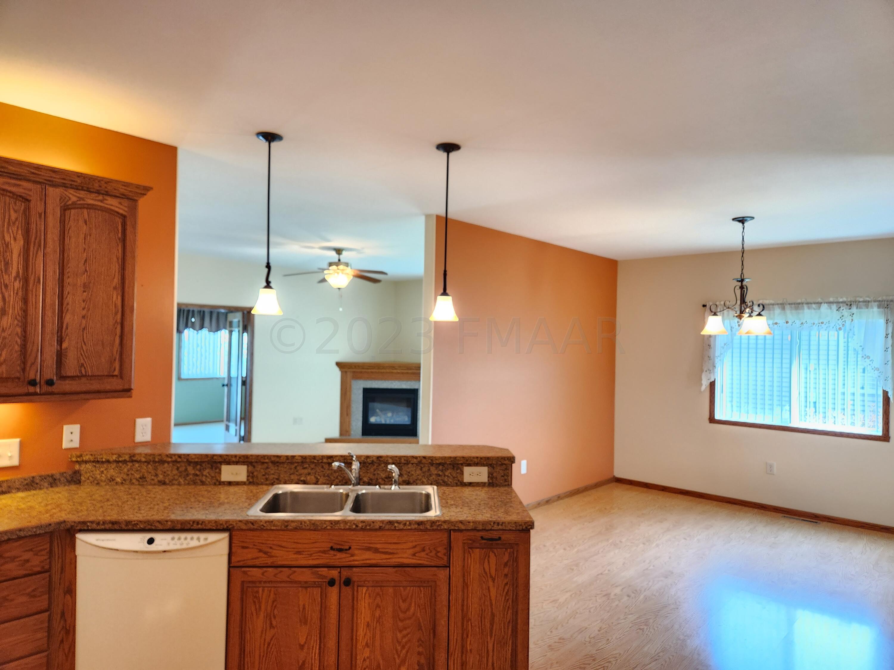 Kitchen to Dining and Living Area
