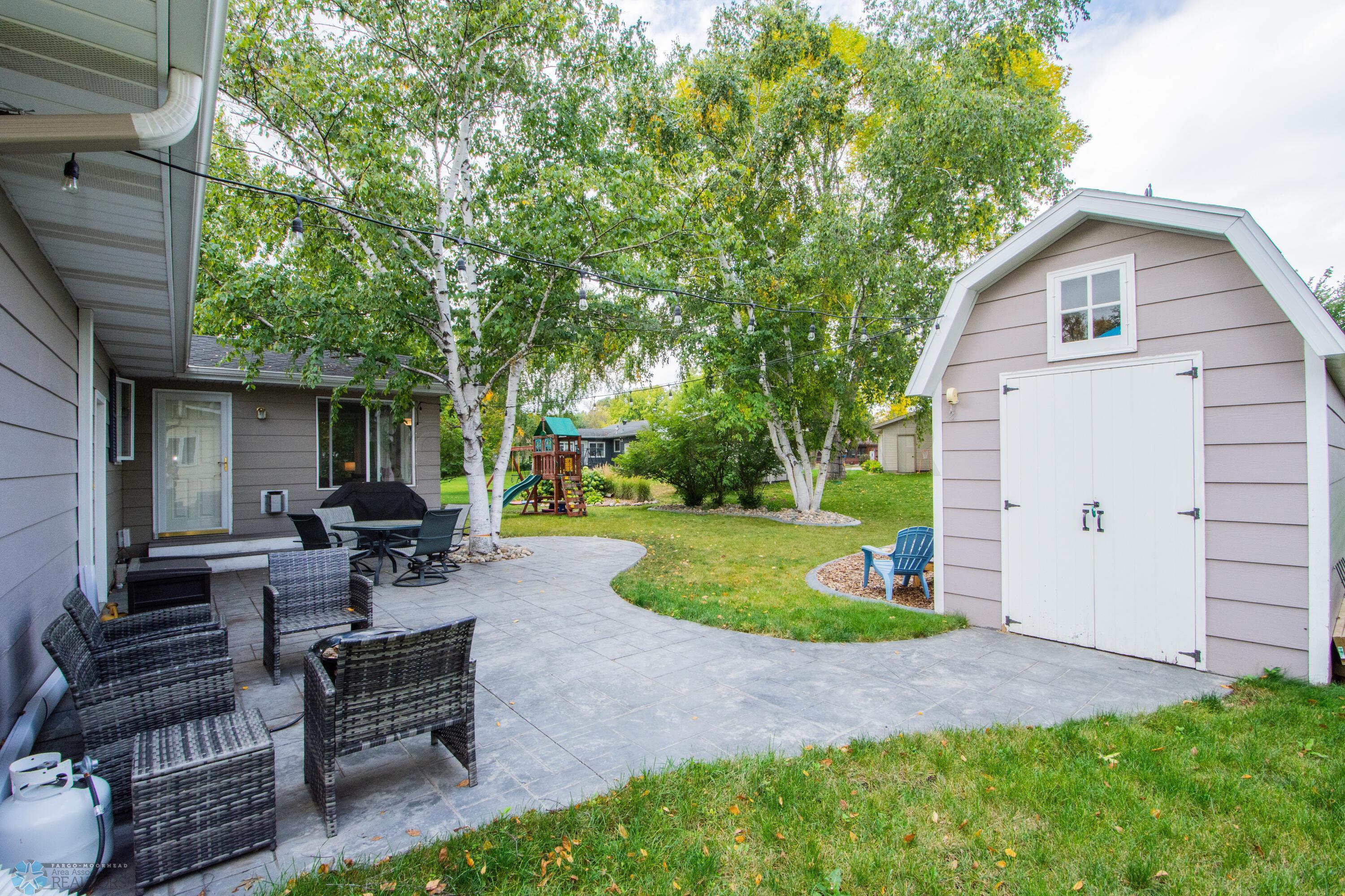 Stamped Concrete Patio and Shed