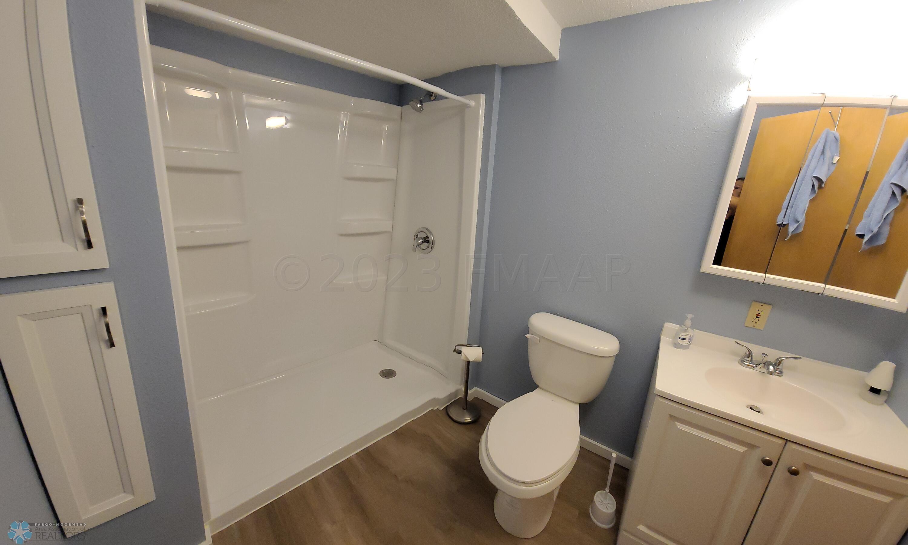 New Bath has walk-in shower