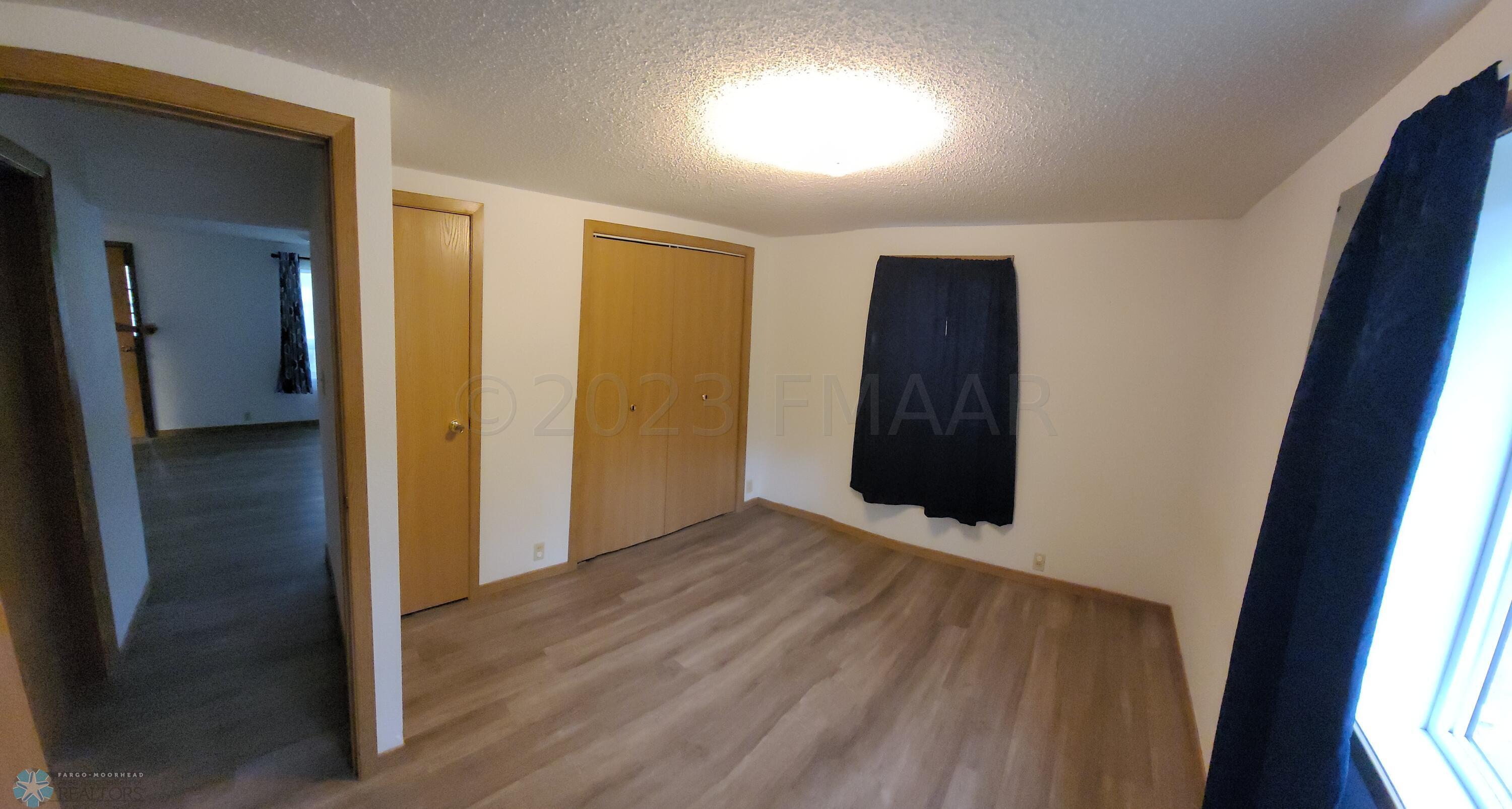 Main bedroom features double closets