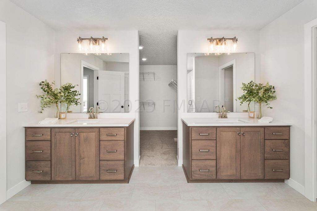 Double vanities to closet