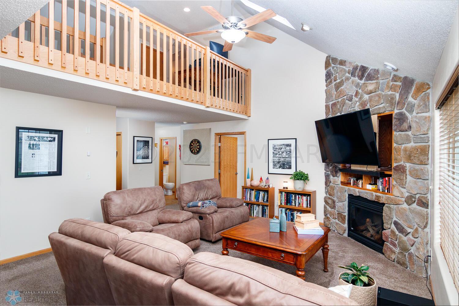 walkway to bedrooms and bonus room