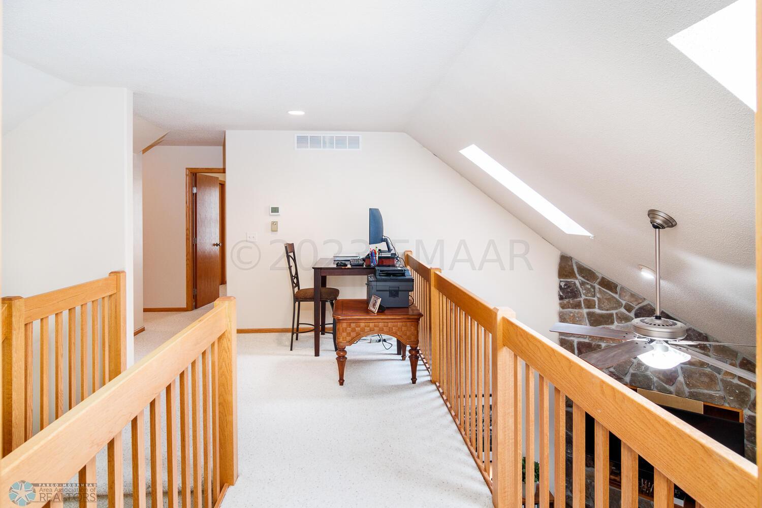 walkway to upper bedrooms