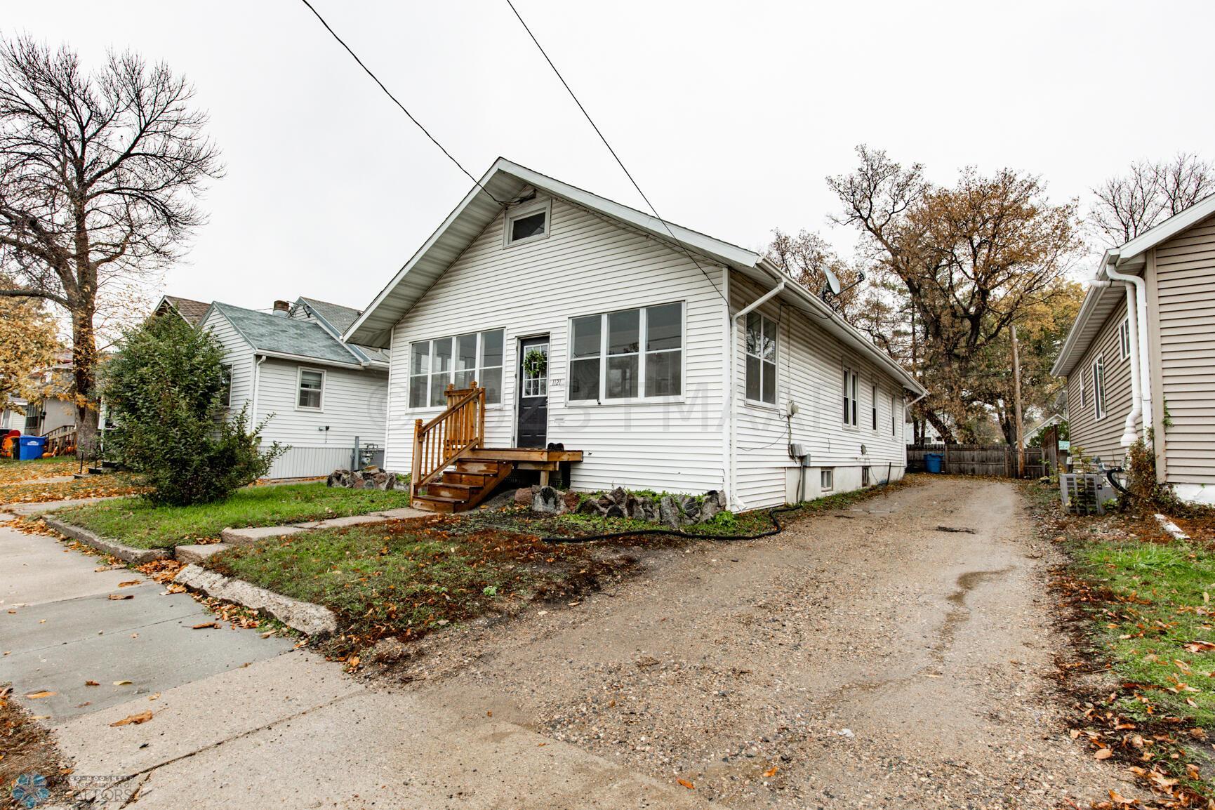 Front/Side Exterior + Driveway