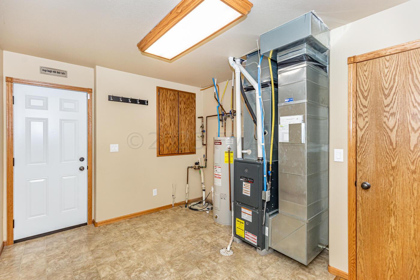 Utility Room with Stairs to the Garage