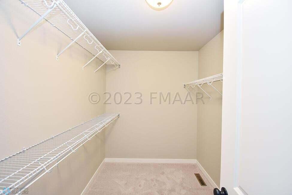 Primary Walk - In Closet
