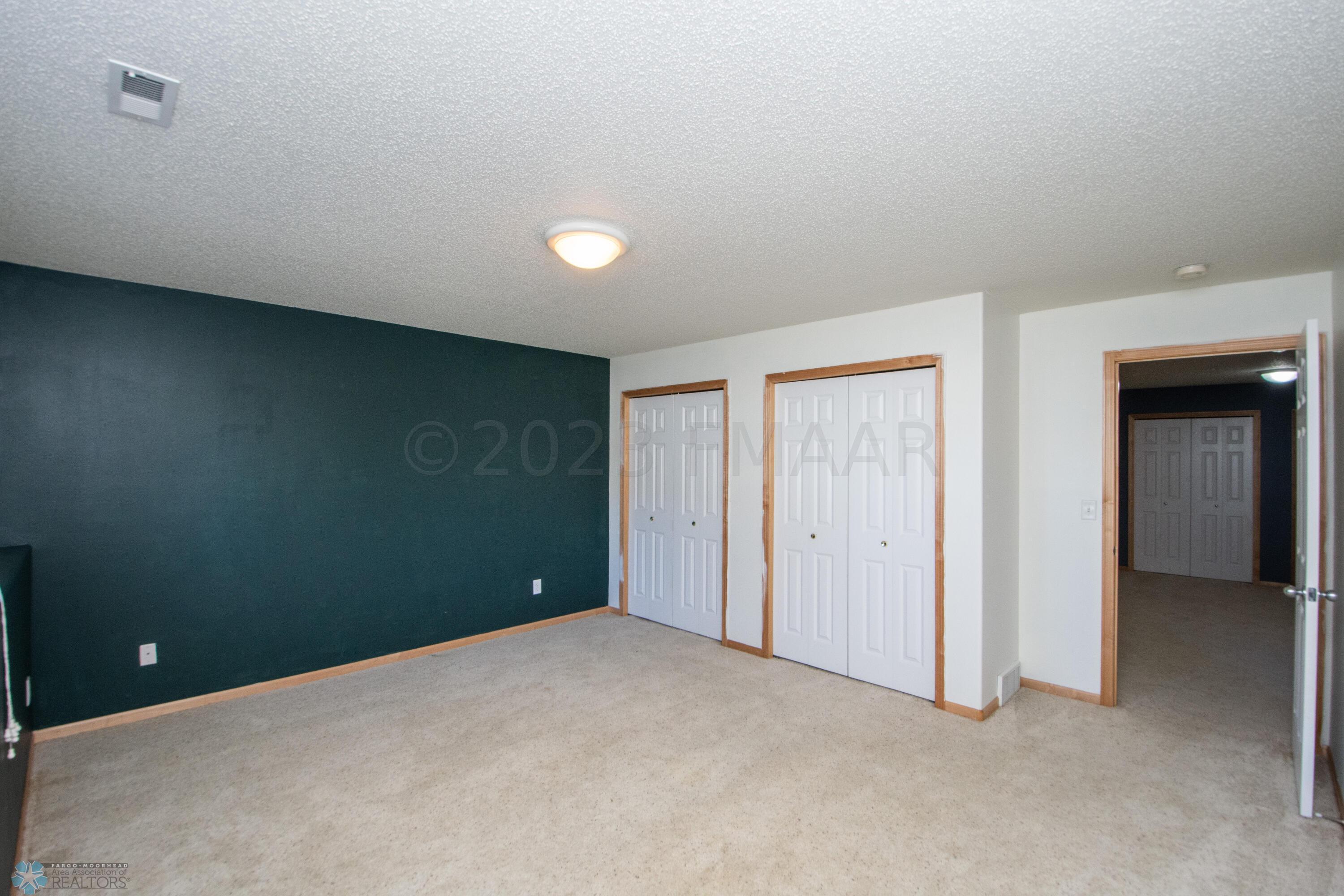 Bedroom downstairs w/ Double Closet
