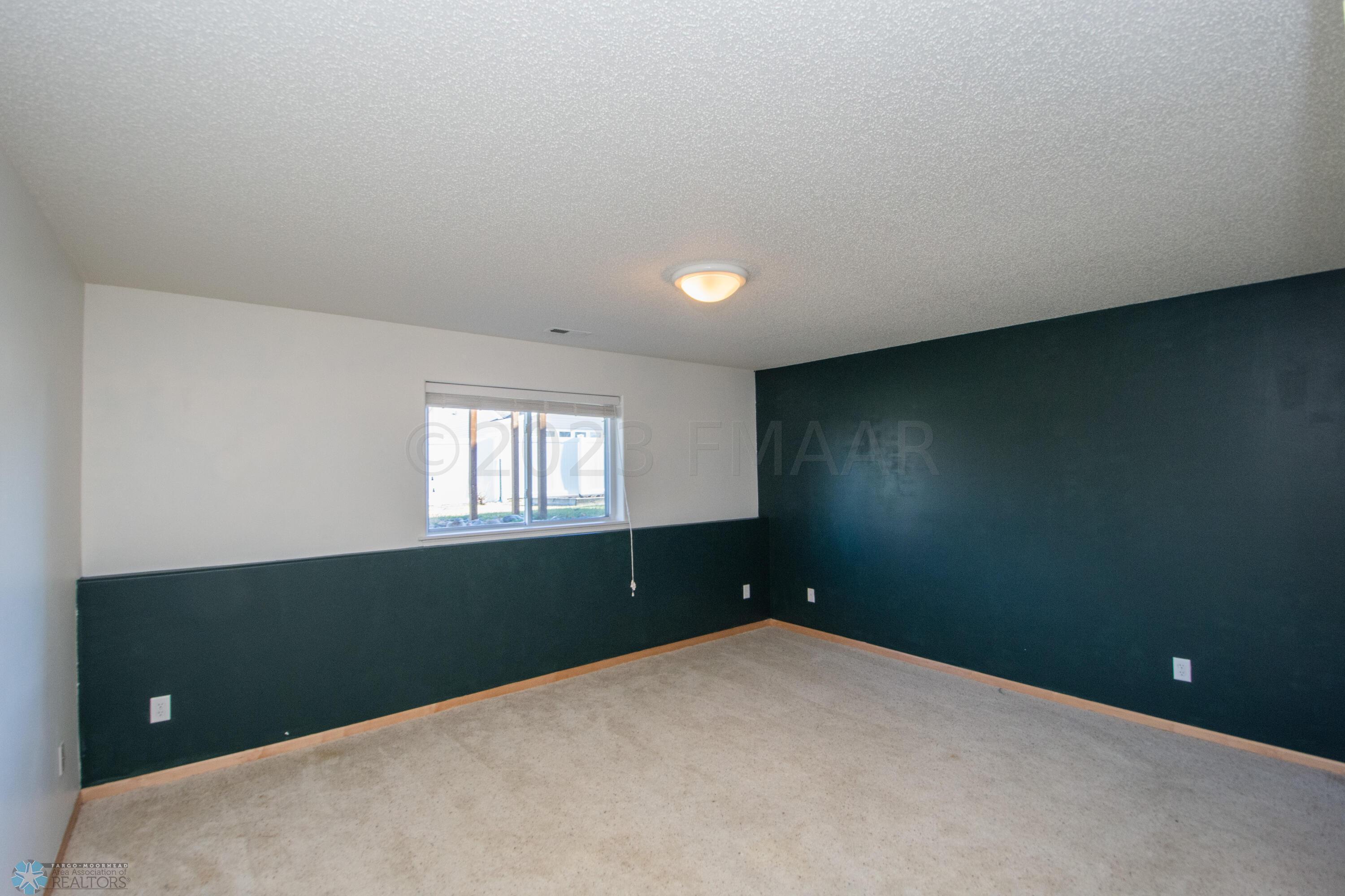 Bedroom downstairs w/ Double Closet