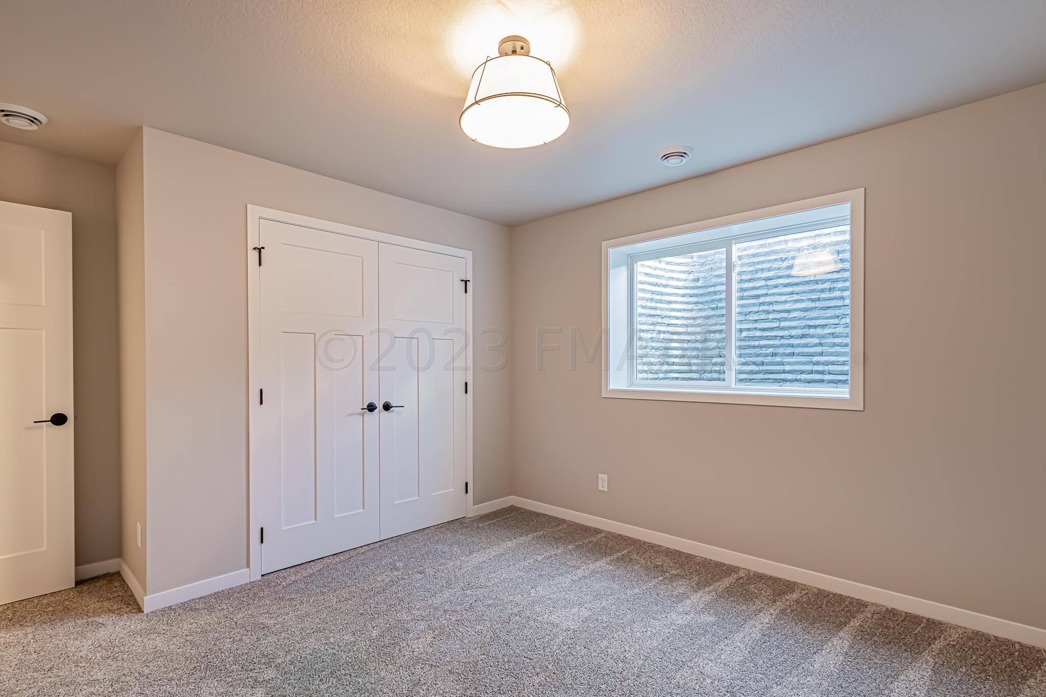 5873 Ellis Drive W, West Fargo, ND 58103