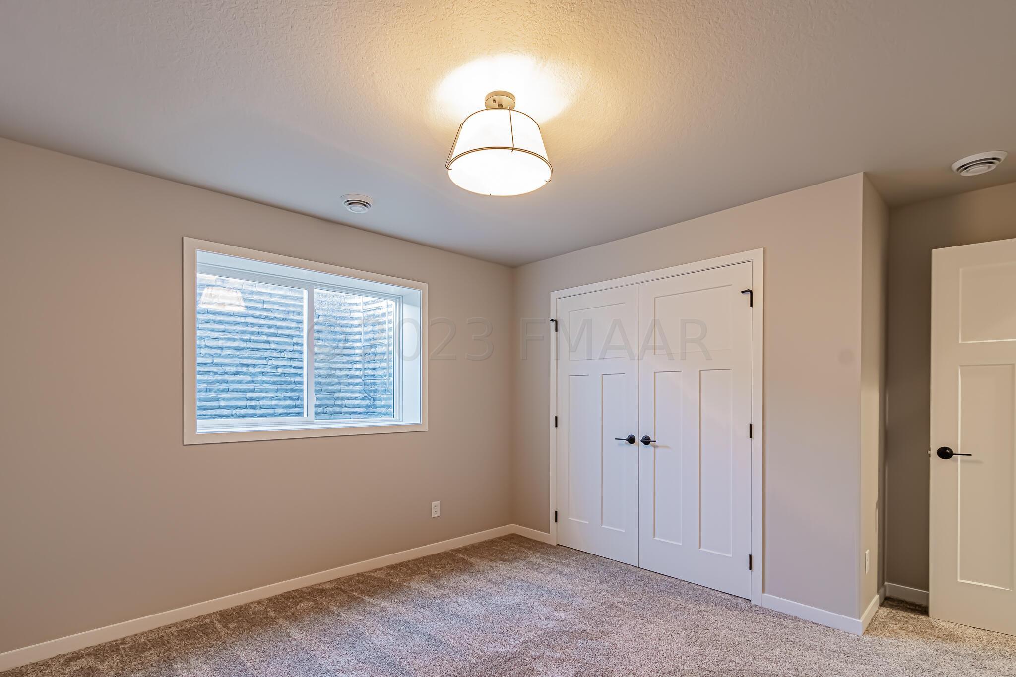 5873 Ellis Drive W, West Fargo, ND 58103