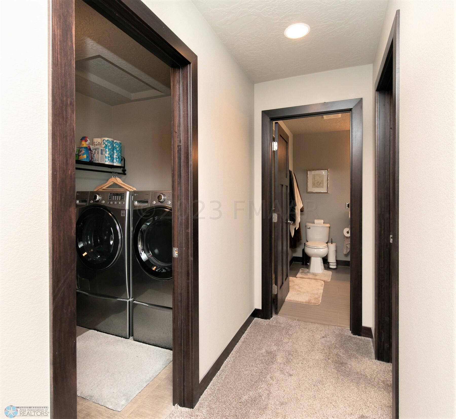 Primary laundry/closet/bath
