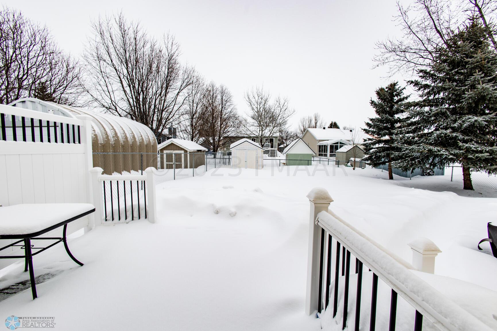 Fully fenced backyard, shed