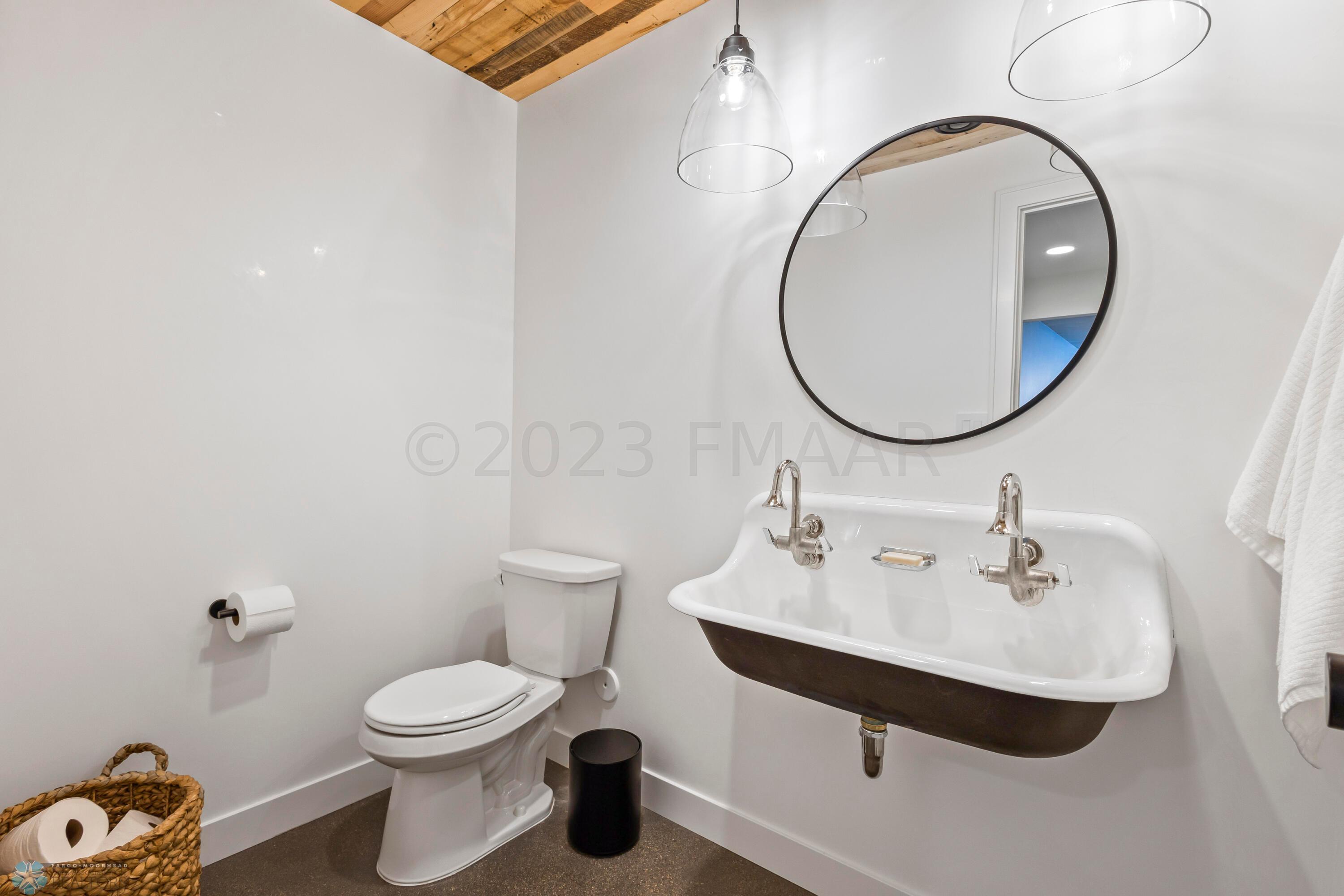 Guest half-bath off the family room