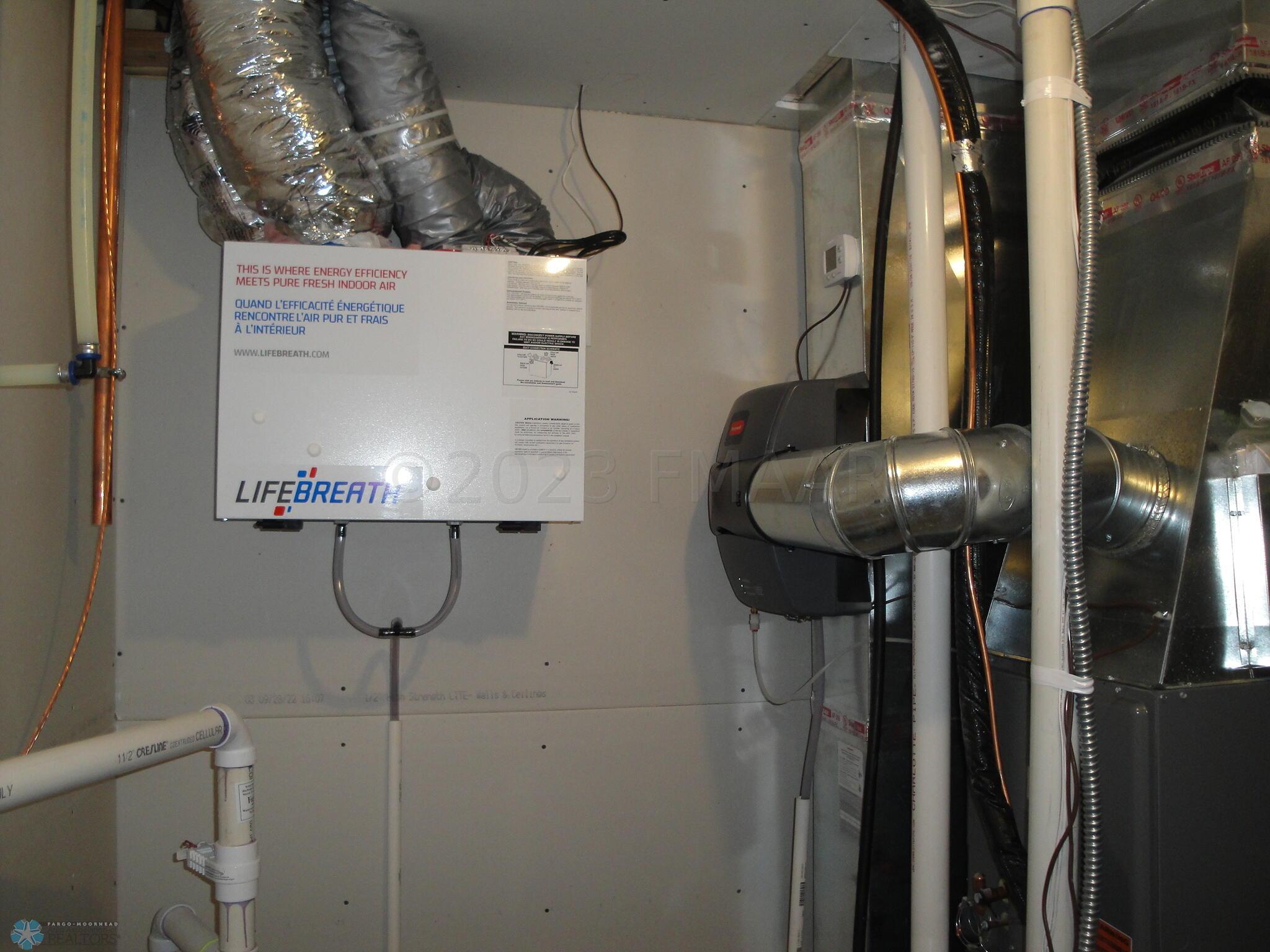 Air exchanger & humidifier