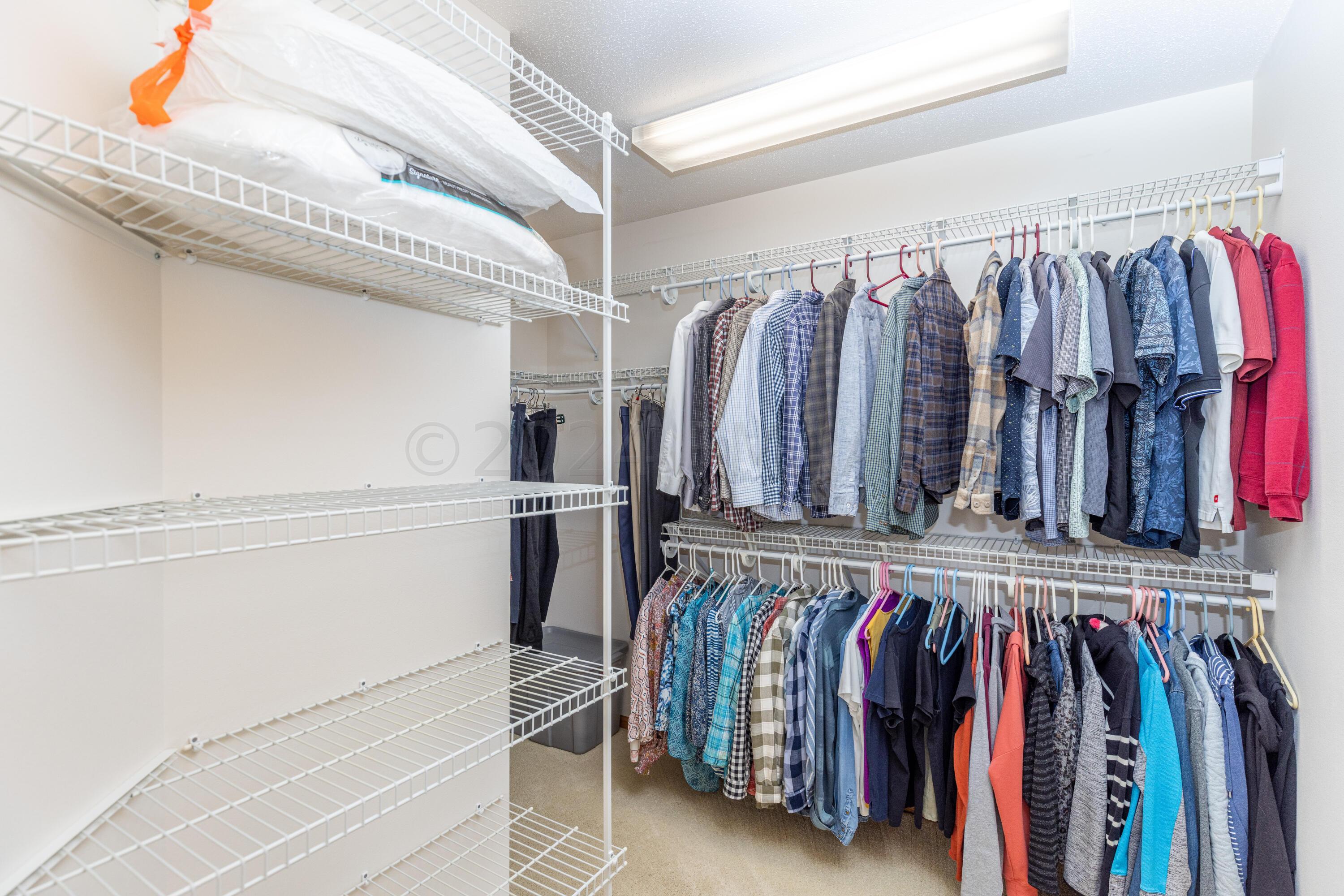 Primary bedroom huge walk-in closet