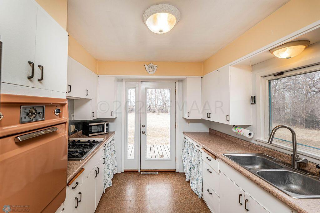 Door to Back Deck in Kitchen