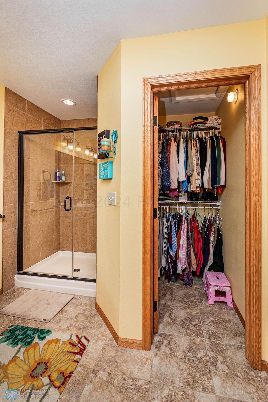 Walkin Closet In Primary Bathroom