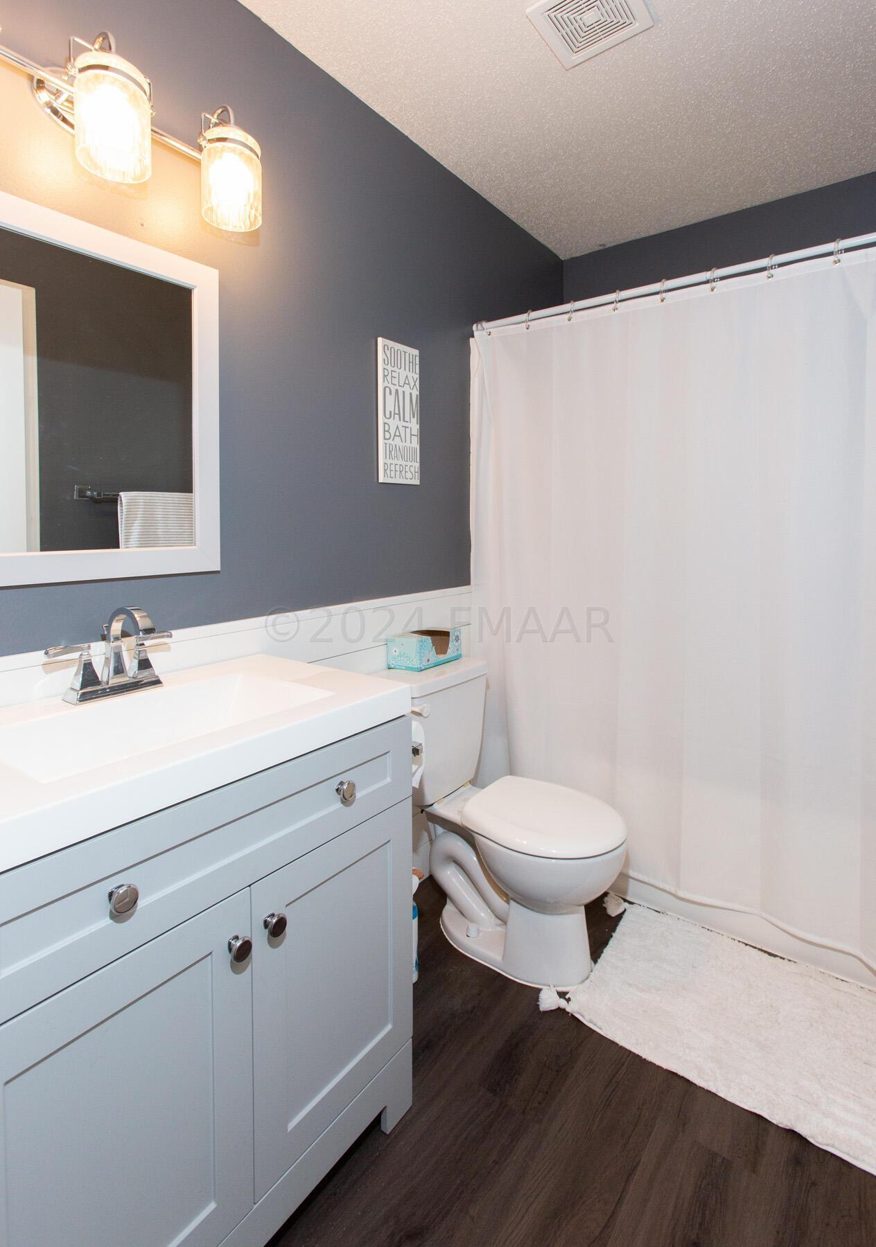 Upper level (guest bath)