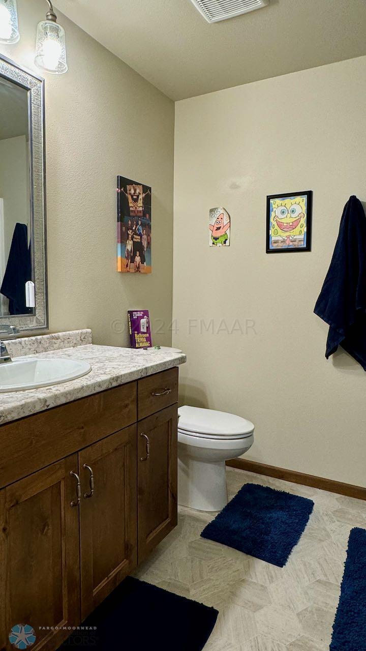 (77) Full Bath in Basement