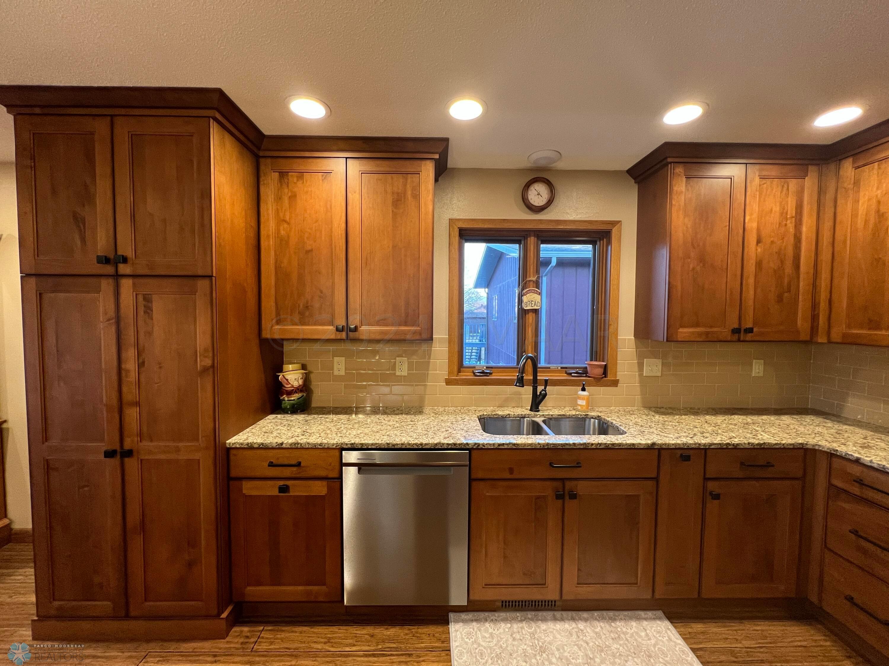 Remodeled kitchen with maple cabinets