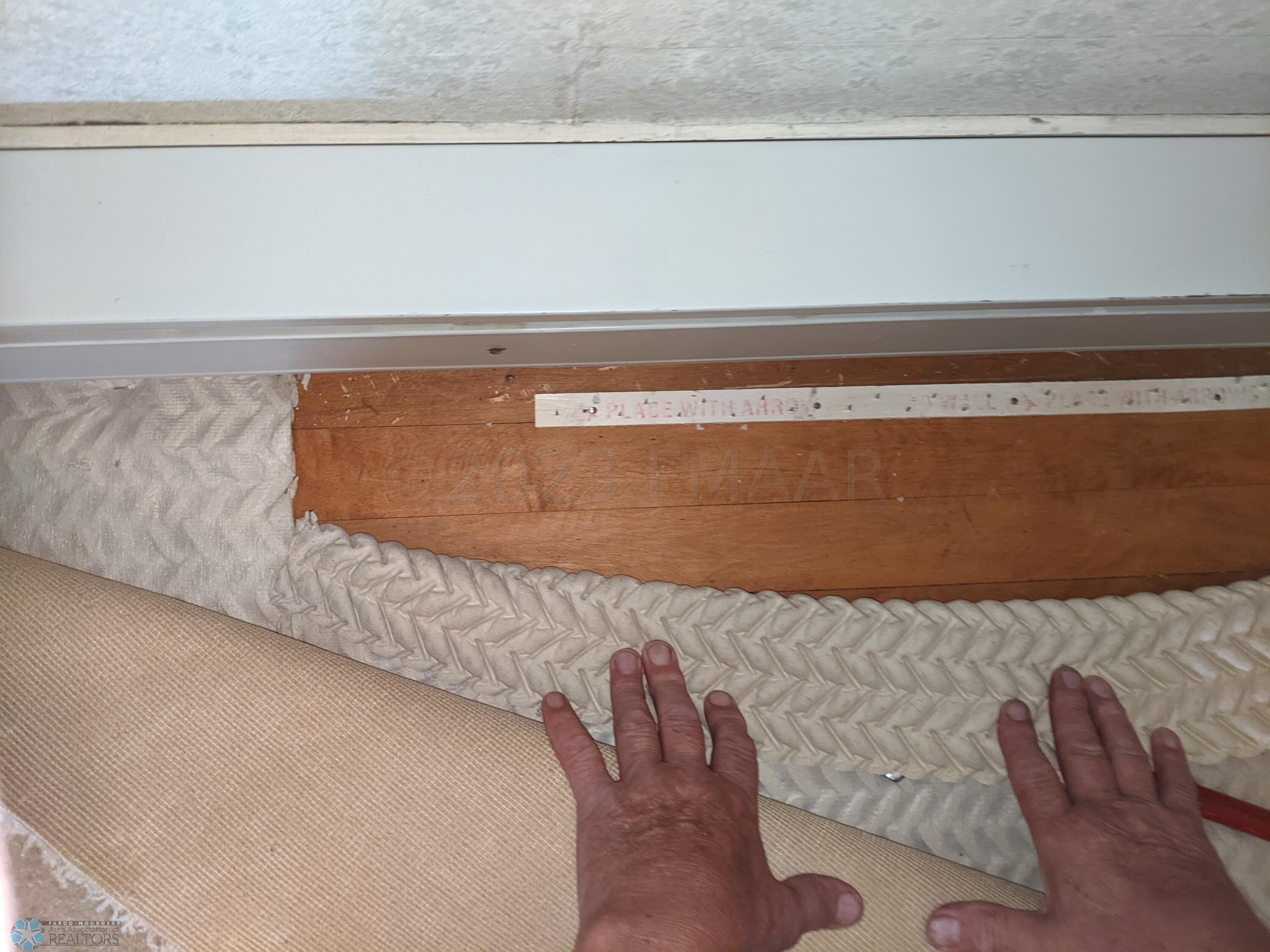 Hardwood flooring under carpet