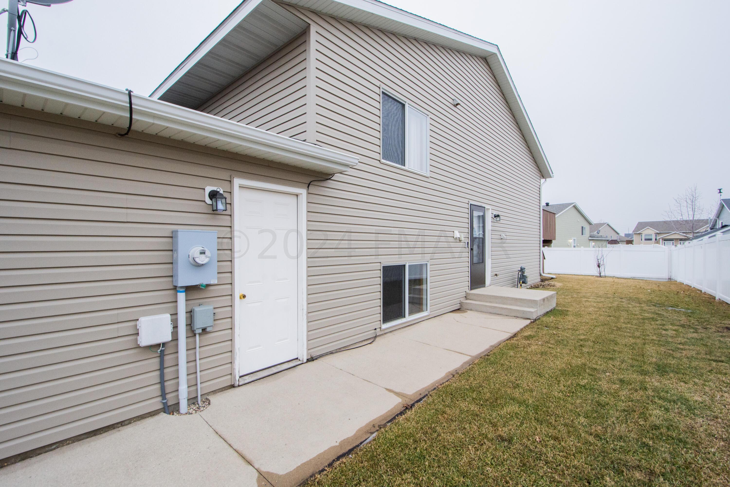 Side Entrance to Garage & Home