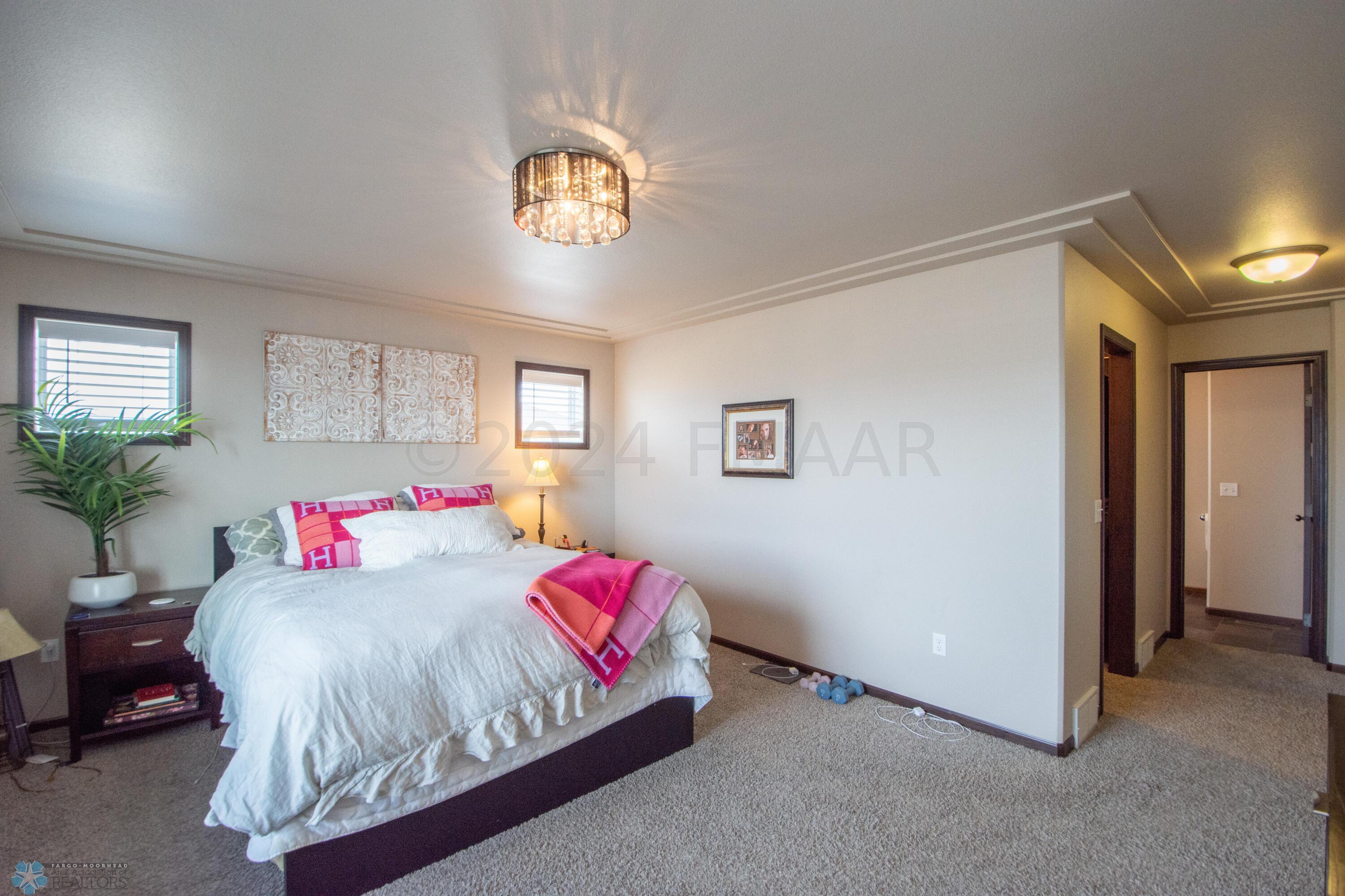 primary bedroom w/ WIC and full bathroom